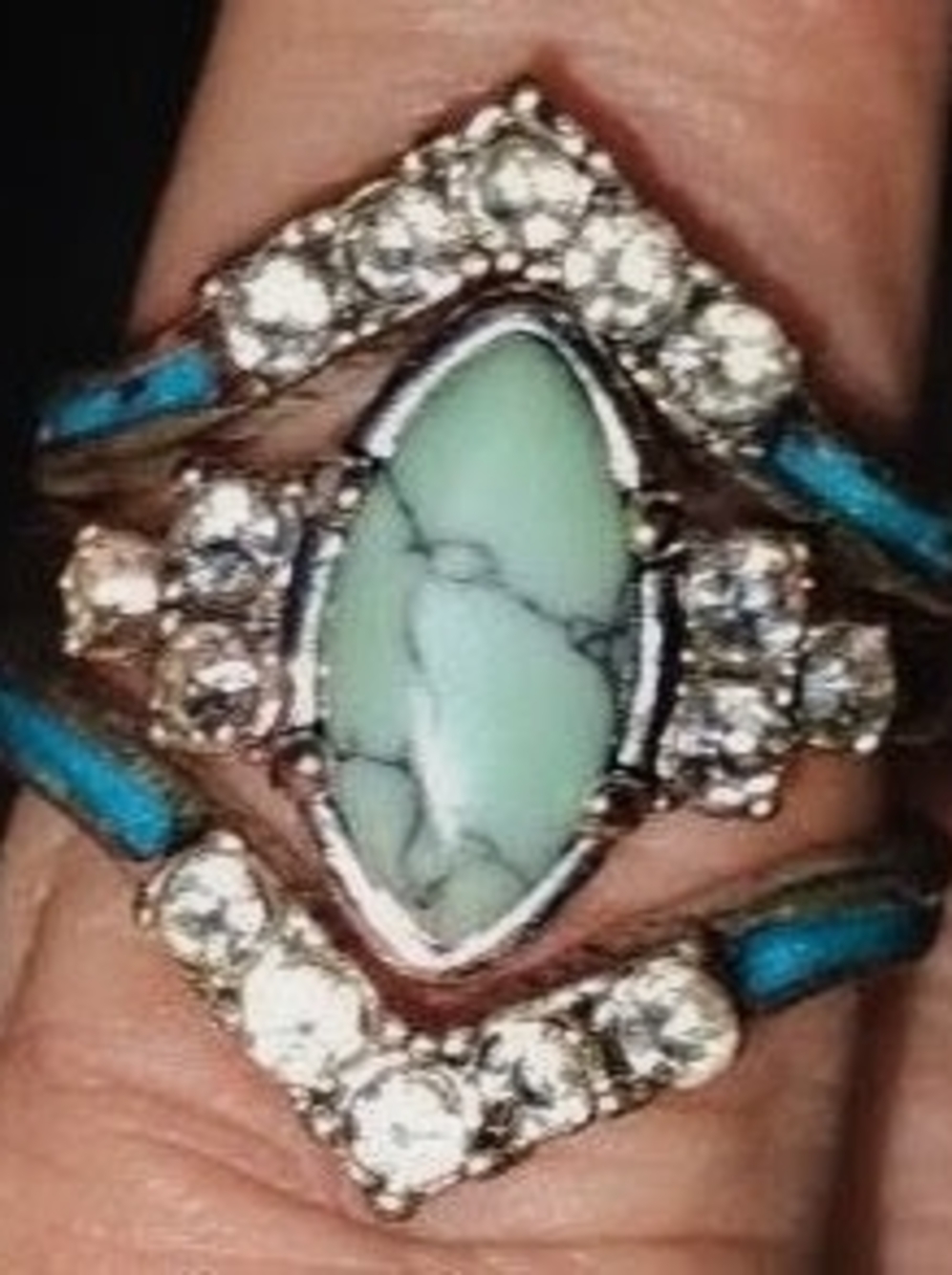 Staghead Designs Raya Marquise engagement ring with diamond accents and ring gua